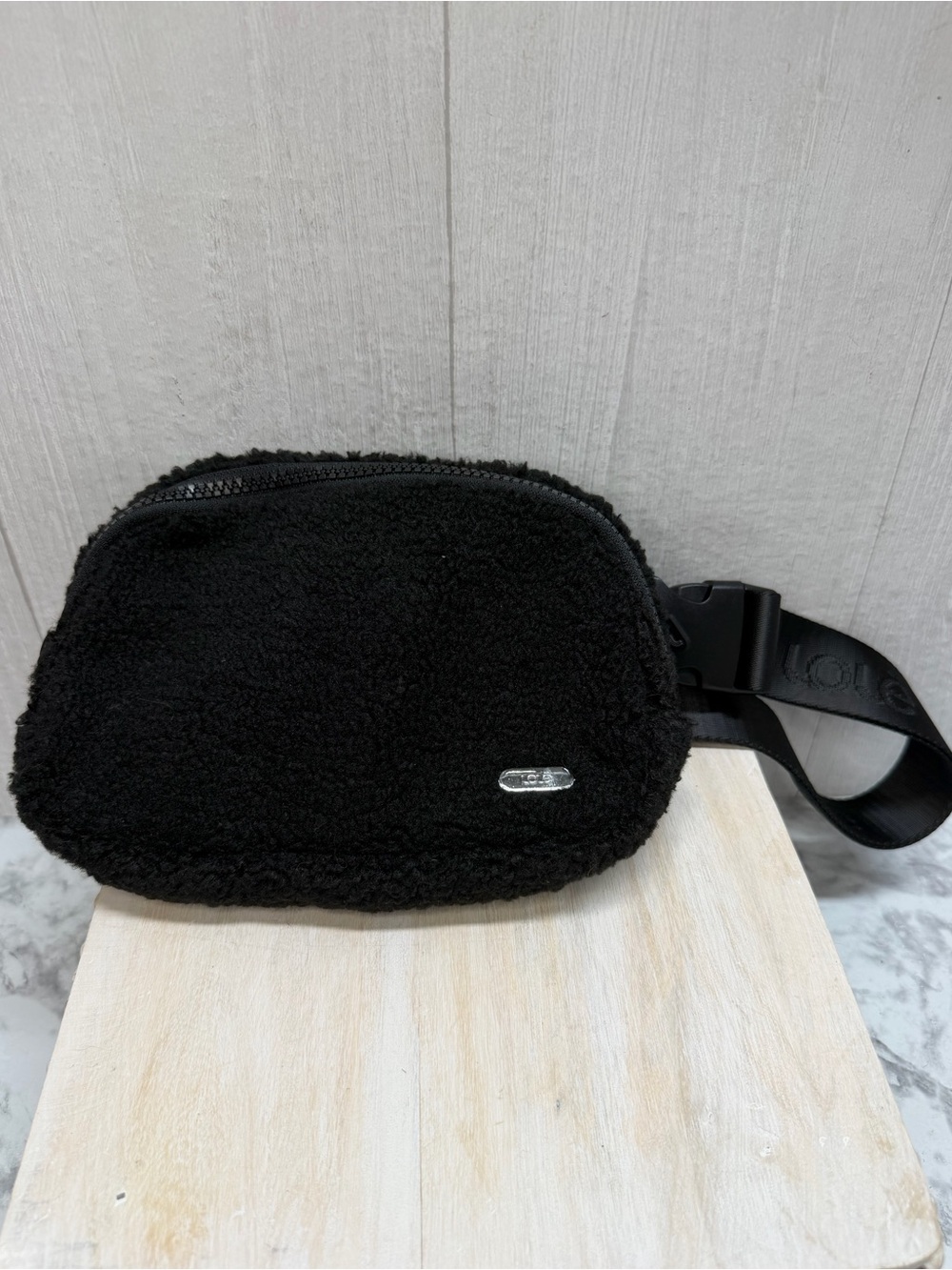 Black Lolë Sherpa Belt Bag fuzzy fleece exterior
Sling bag crossbody fanny pack